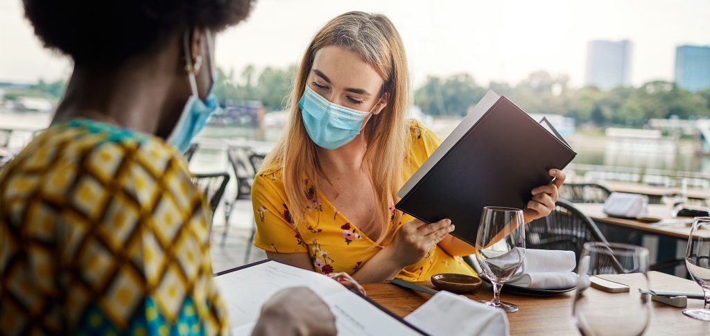 People dining with masks