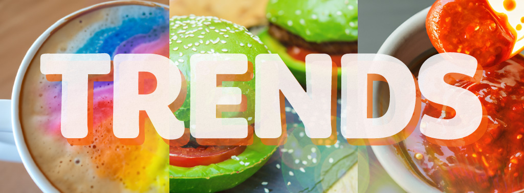the word "Trends" overlaying a collage of trendy food items, such as a rainbow latte and avocado bun